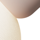 The coral Buia Pendant Light from Gantri close up.