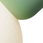 The sage Buia Pendant Light from Gantri close up.