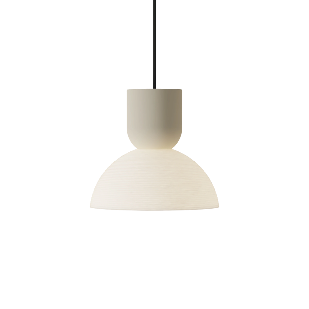The sand Buia Pendant Light from Gantri with the black cord.