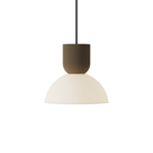 The walnut Buia Pendant Light from Gantri with the black cord.