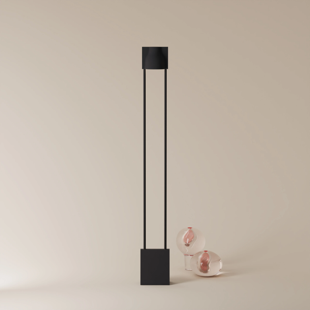 The carbon Carve Floor Light from Gantri with the black rod option.