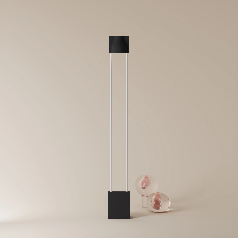 The carbon Carve Floor Light from Gantri with the white rod option.