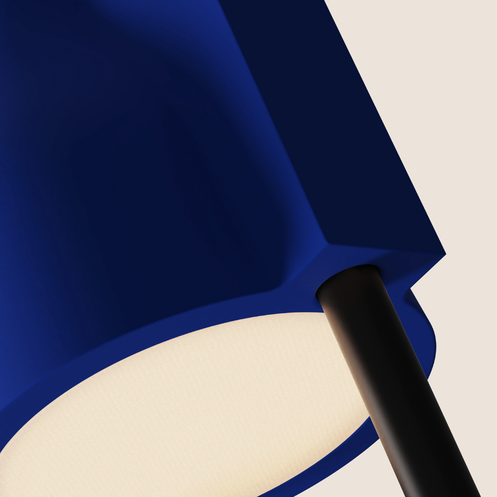 The cobalt Carve Floor Light from Gantri with the black rod option close up.