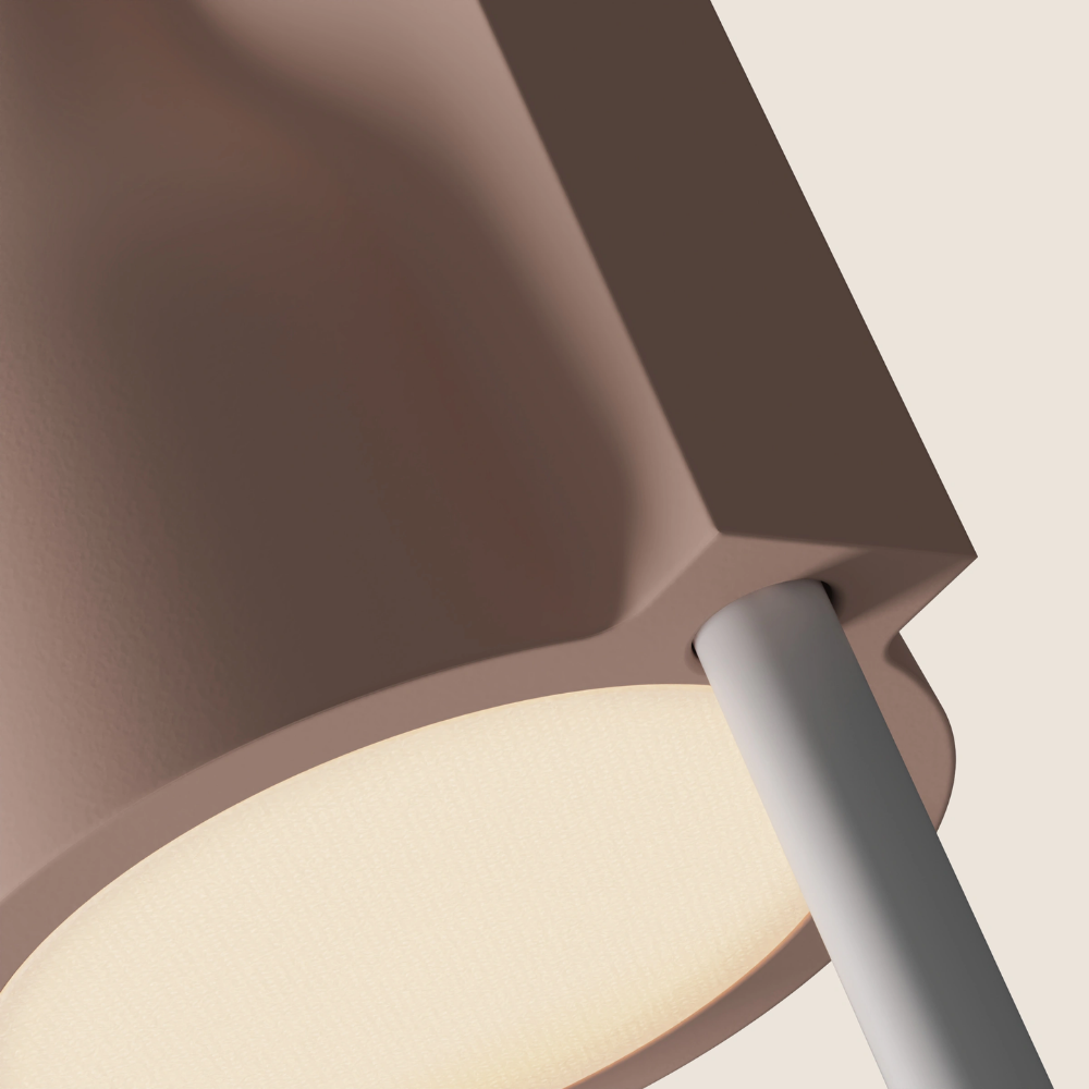 The coral Carve Floor Light from Gantri with the white rod option close up.
