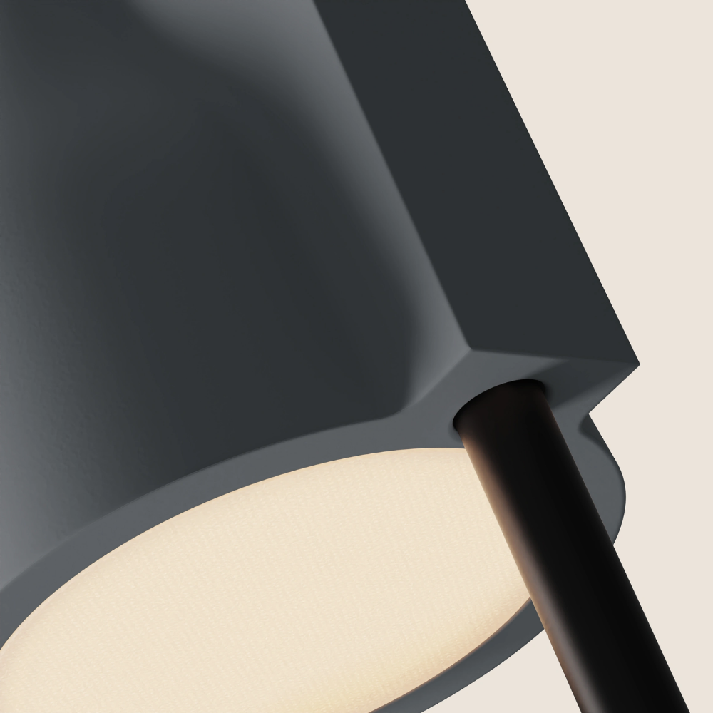 The fog Carve Floor Light from Gantri with the black rod option close up.