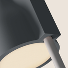 The fog Carve Floor Light from Gantri with the white rod option close up.