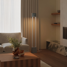 The fog Carve Floor Light from Gantri with the white rod option in a living space.
