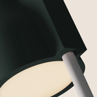 The forest Carve Floor Light from Gantri with the white rod option close up.