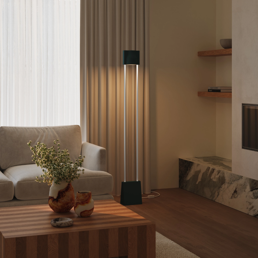 The forest Carve Floor Light from Gantri with the white rod option in a living space.