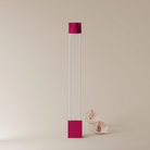 The hibiscus Carve Floor Light from Gantri with the white rod option.