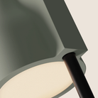 The meadow Carve Floor Light from Gantri with the black rod option close up.