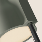 The meadow Carve Floor Light from Gantri with the chrome rod option close up.