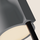 The mist Carve Floor Light from Gantri with the black rod option close up.