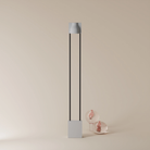 The mist Carve Floor Light from Gantri with the black rod option.