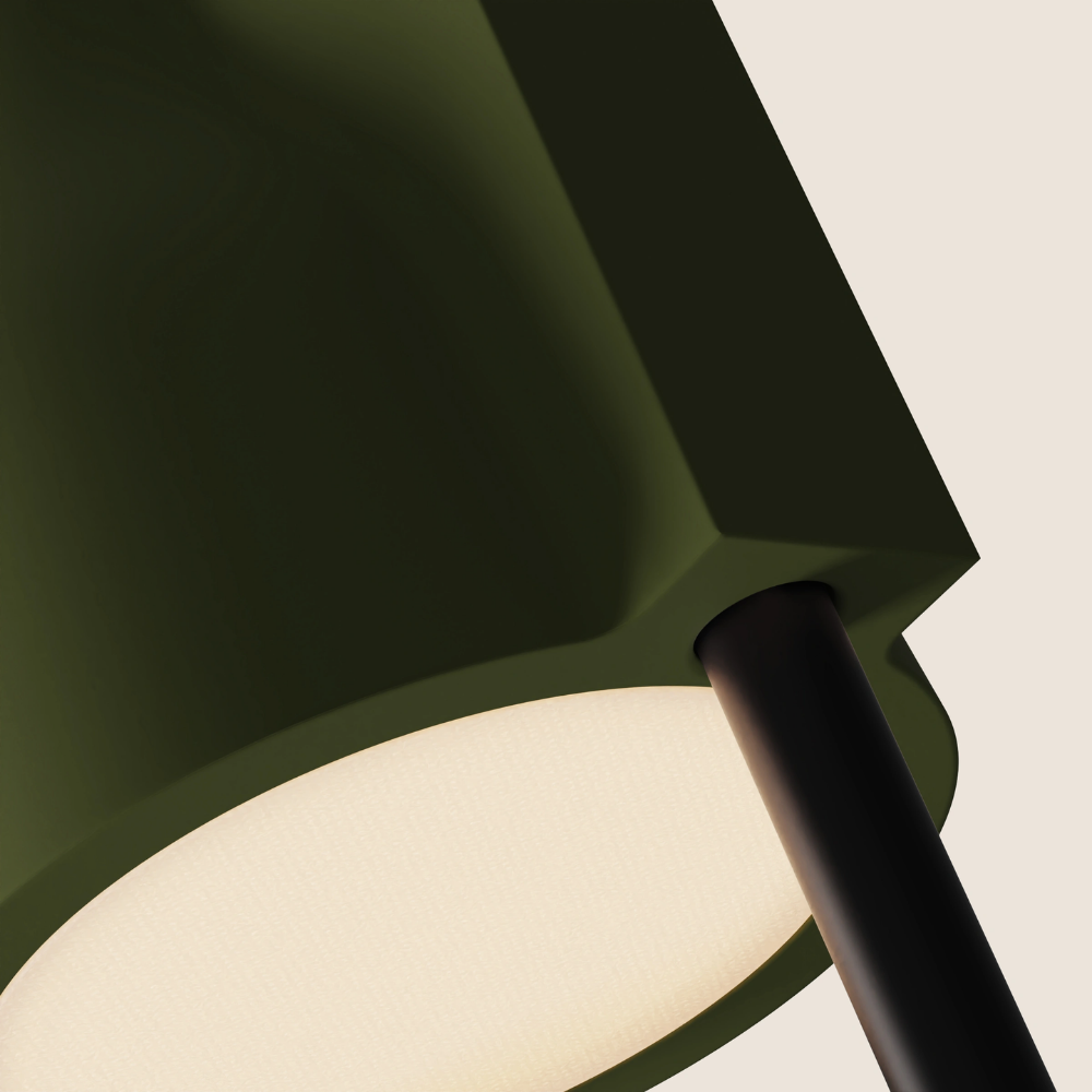 The olive Carve Floor Light from Gantri with the black rod option close up.
