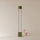 The olive Carve Floor Light from Gantri with the chrome rod option.