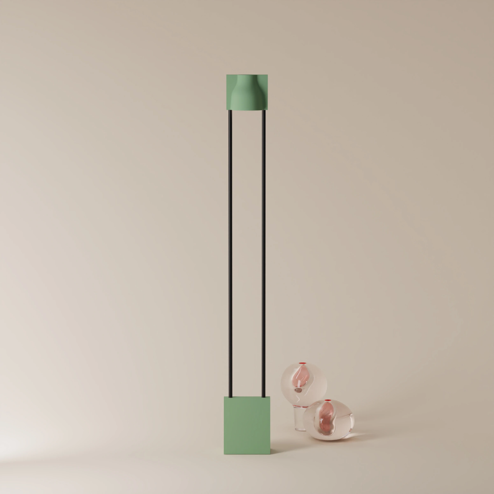 The sage Carve Floor Light from Gantri with the black rod option.