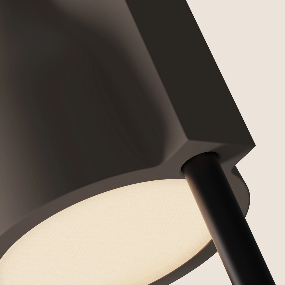 The smoke Carve Floor Light from Gantri with the black rod option close up.
