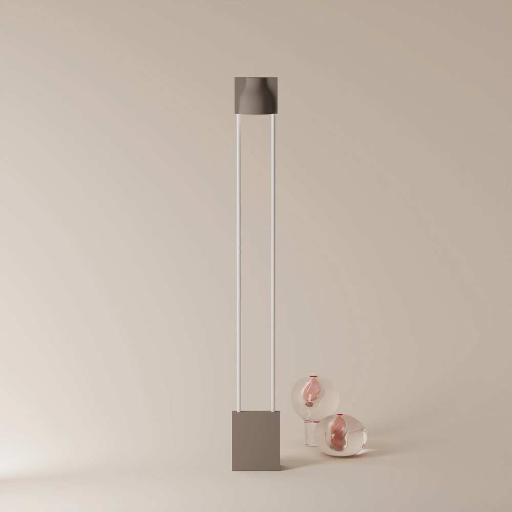 The smoke Carve Floor Light from Gantri with the white rod option.