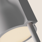 The snow Carve Floor Light from Gantri with the white rod option close up.