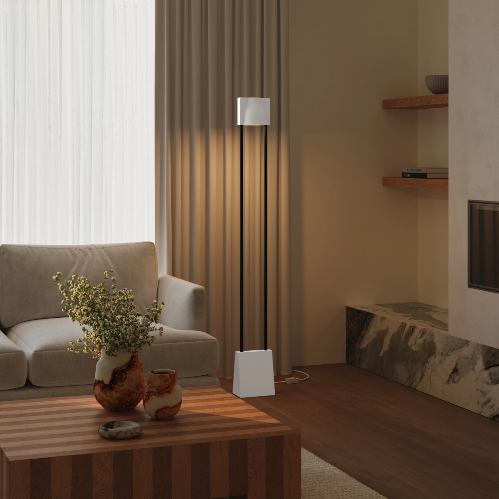 The stone Carve Floor Light from Gantri with the black rod option in a living room.