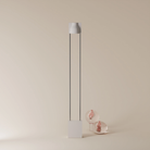 The stone Carve Floor Light from Gantri with the chrome rod option.