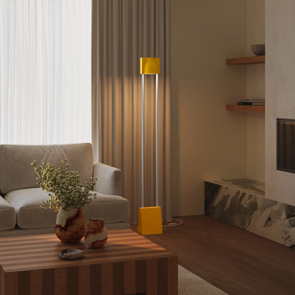 The sunrise Carve Floor Light from Gantri with the white rod option in a living space.