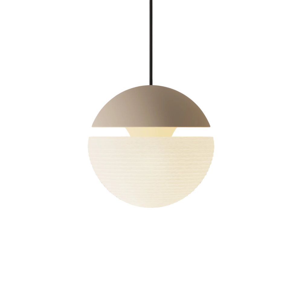The peach Cora Pendant Light from Gantri with the black cord.
