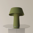 The olive Fold Table Light from Gantri.