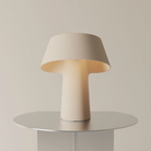 The peach Fold Table Light from Gantri.