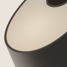 The smoke Fold Table Light from Gantri close up.