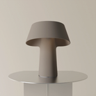 The smoke Fold Table Light from Gantri.