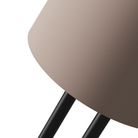 The coral Gio Floor Light from Gantri with the black rod option close up.