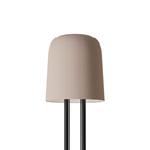The coral Gio Floor Light from Gantri with the black rod option.