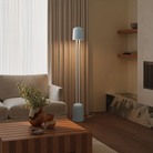 The sky Gio Floor Light from Gantri with the white rod option in a lounge area for entertaining.