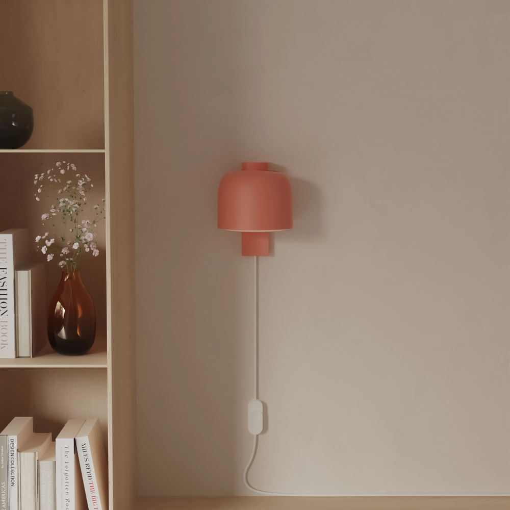 The blossom Gio Wall Light from Gantri in a living room.