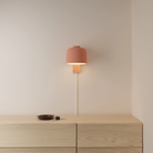The blossom Gio Wall Light from Gantri in a primary bedroom.
