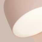 The coral Gio Wall Light from Gantri close up.