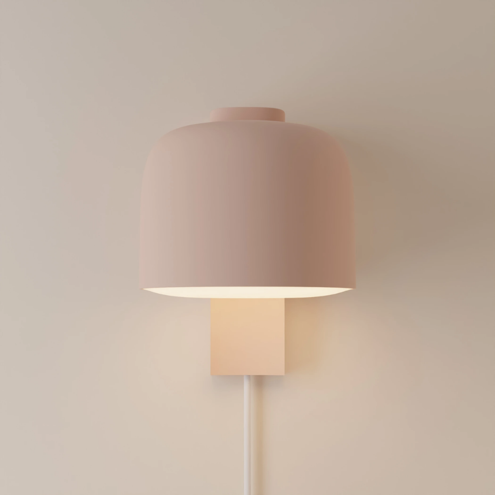The coral Gio Wall Light from Gantri.