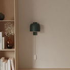 The forest Gio Wall Light from Gantri in a living room.