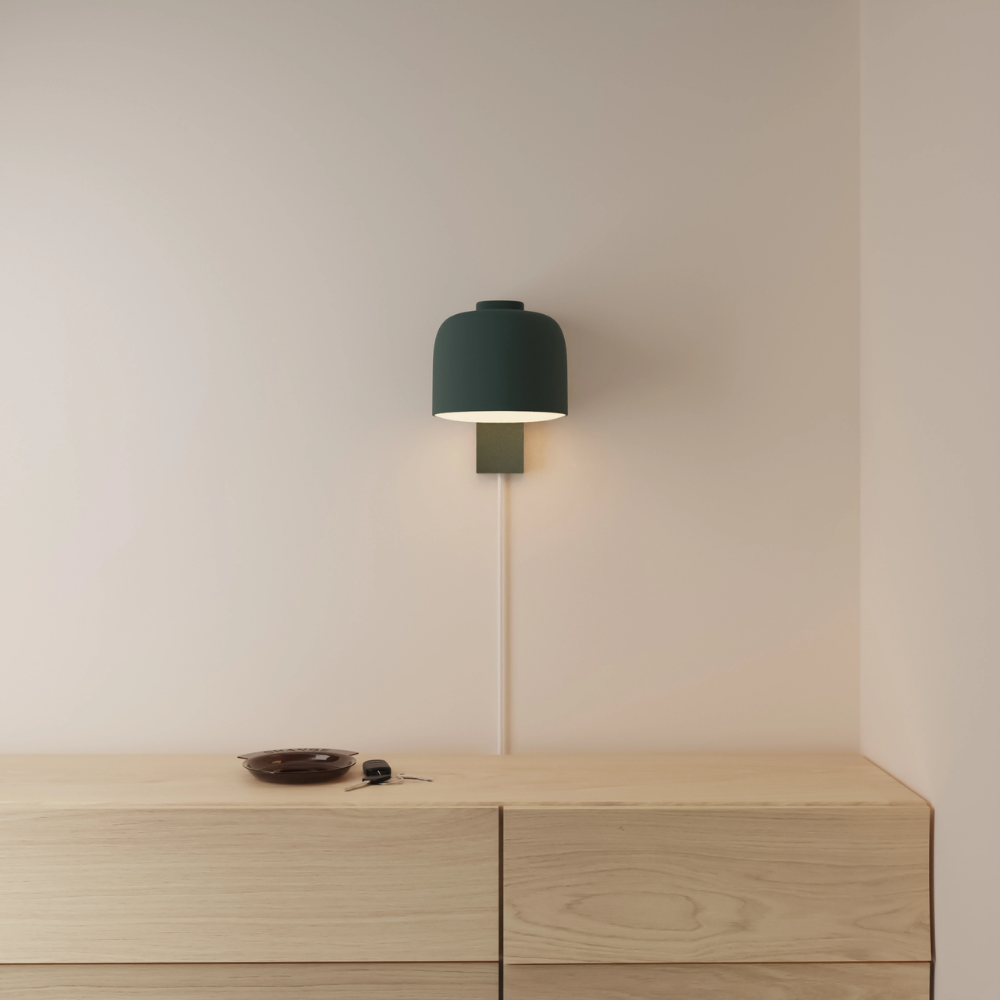 The forest Gio Wall Light from Gantri in a primary bedroom.