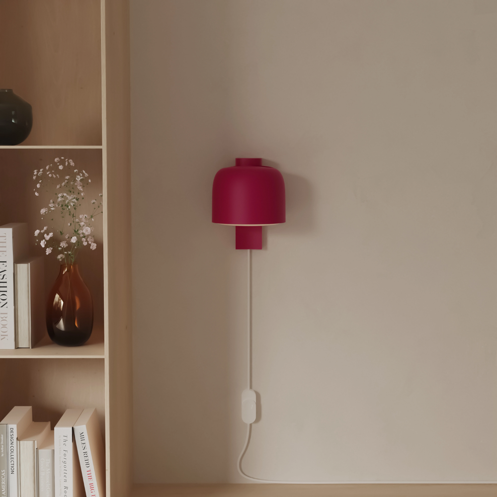 The hibiscus Gio Wall Light from Gantri in a living room.