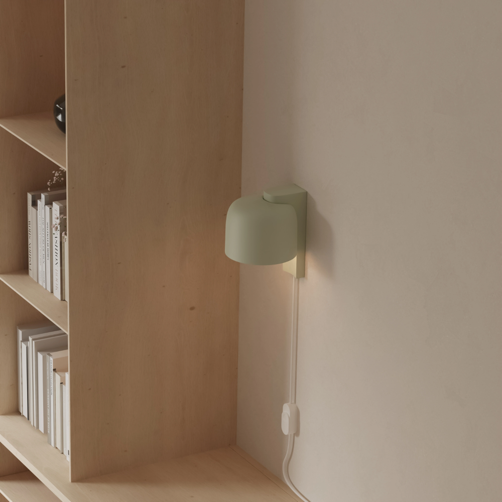 The meadow Gio Wall Light from Gantri in a home office.