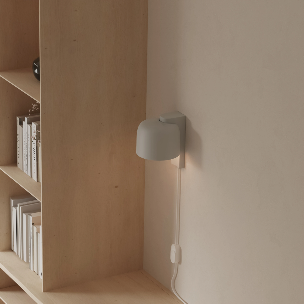 The mist Gio Wall Light from Gantri in a home office.