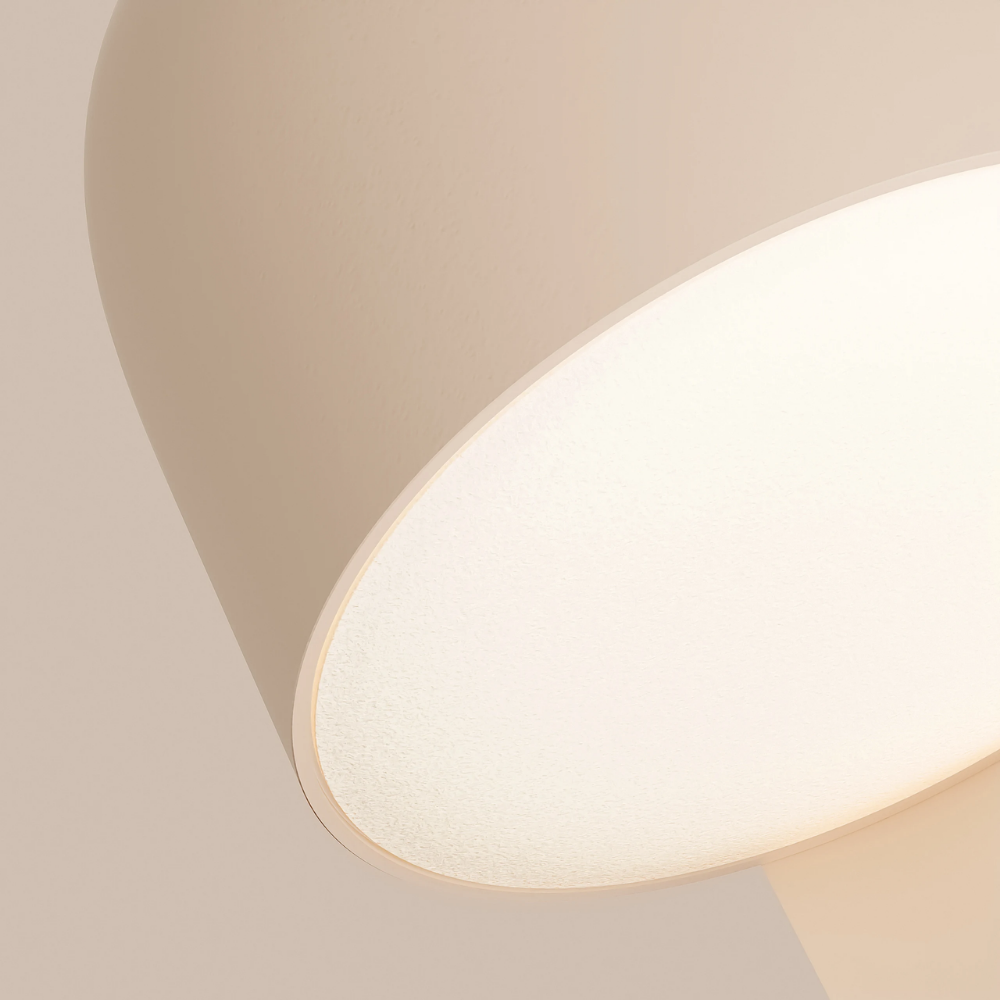 The peach Gio Wall Light from Gantri close up.