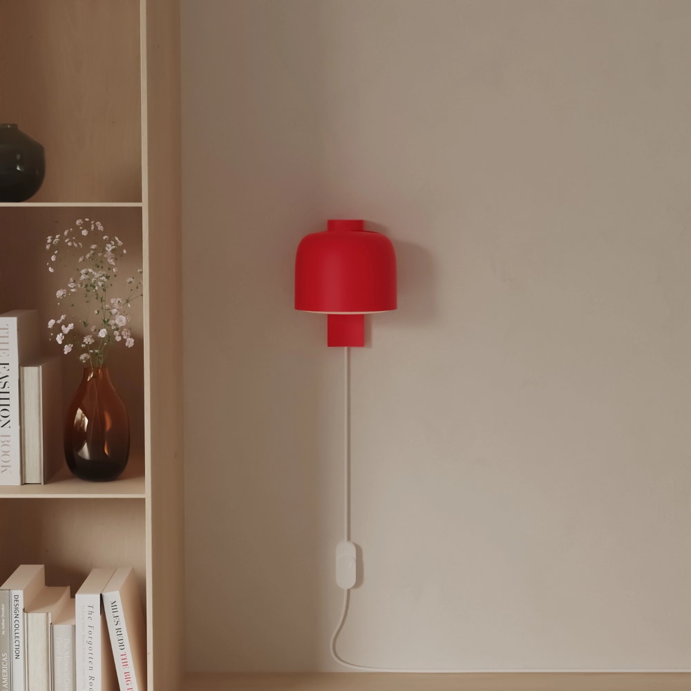 The poppy Gio Wall Light from Gantri in a living room.