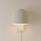 The sand Gio Wall Light from Gantri in a studio.