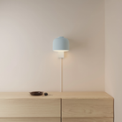 The sky Gio Wall Light from Gantri in a primary bedroom.