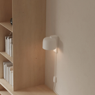 The snow Gio Wall Light from Gantri in a home office.