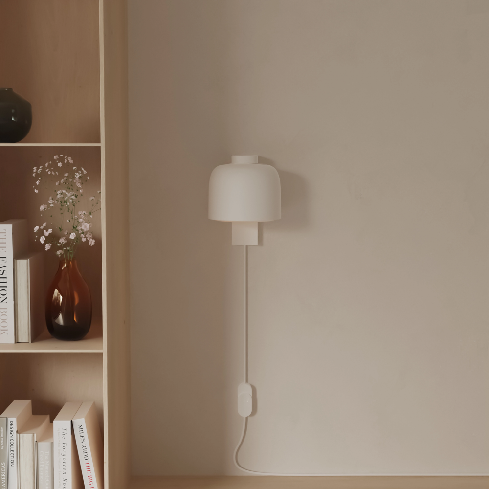 The snow Gio Wall Light from Gantri in a living room.